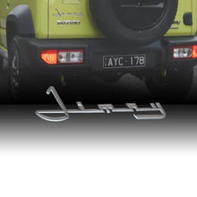 Jimny, suzuki jimny, jimny badge, jimny retro badge, suzuki accessories, suzuki exterior accessories, suzuki jimny accessories, suzuki swift, suzuki swift accessories, suzuki jimny accessories 2025, suzuki swift car accessories, suzuki badge emblem, suzuki emblem badge, car retro badge, jimny abs logo, suzuki abs badge, Jimny metal sticker, Jimny logo sticker, Jimny vintage emblem, Jimny red badge, jimny chrome badge, Jimny adhesive emblem, Jimny retro logo metal plate